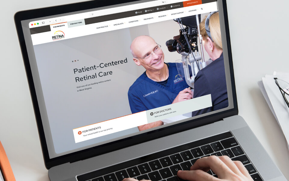 Laptop displaying the new Retina Consultants, PLLC website.